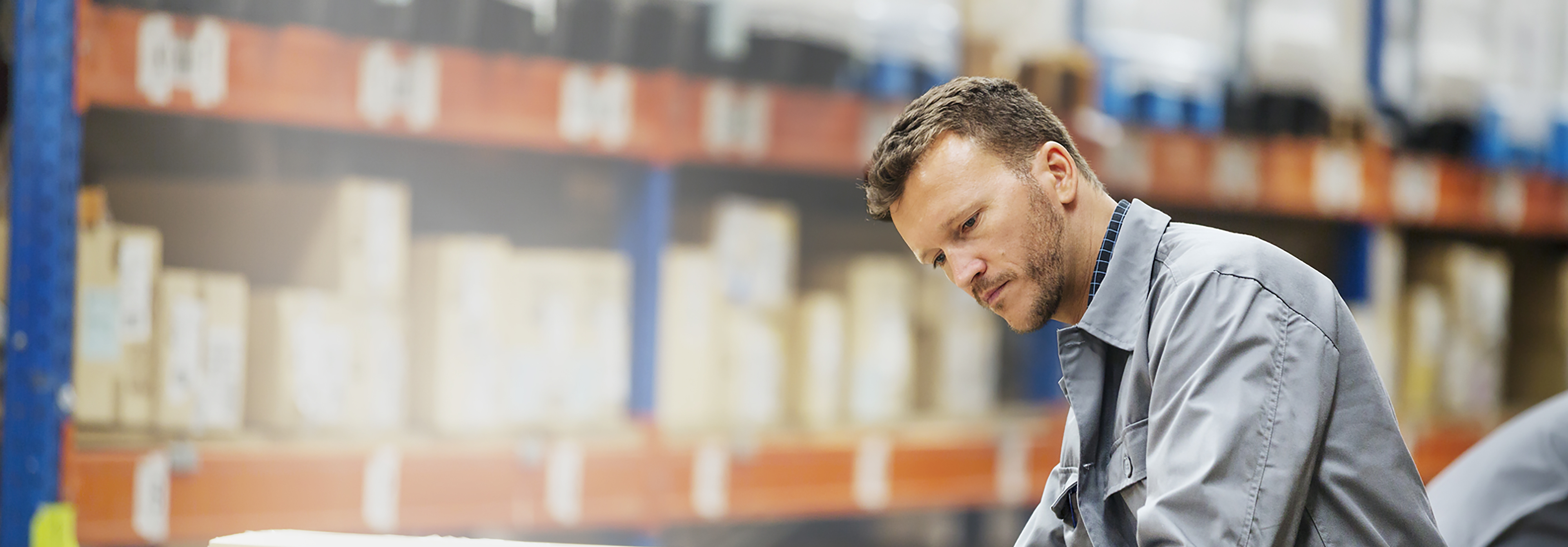 Image of a man with a beard at a hardware store